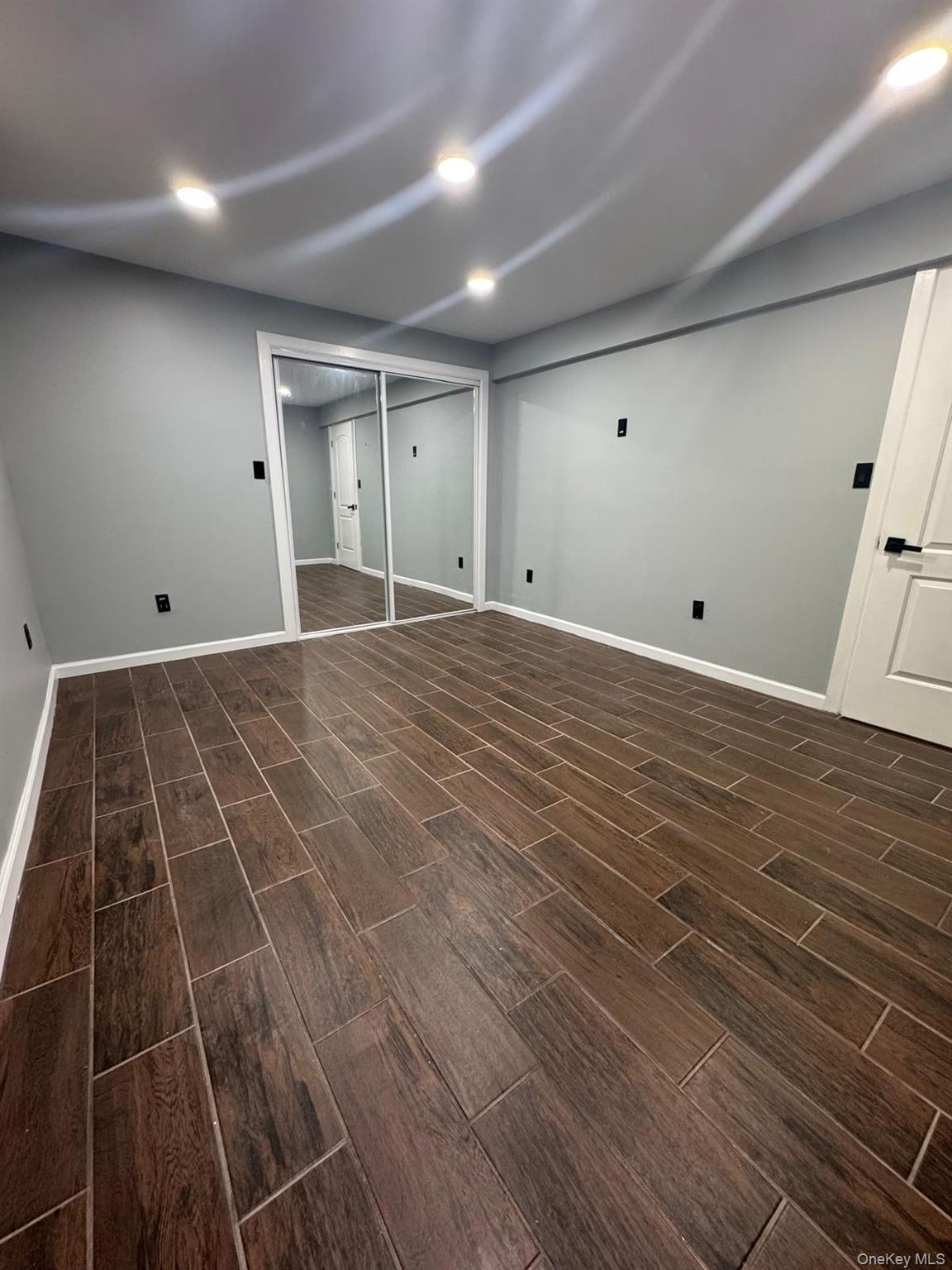 116-23 Inwood Street Queens, NY 11436 - Photo 9 of 22 a view of an empty room