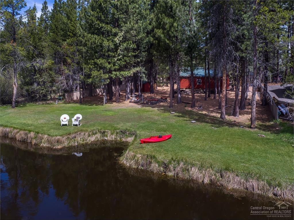 17171 Island Loop Way Bend, OR 97707 - Photo 13 of 25 a view of a park with large trees