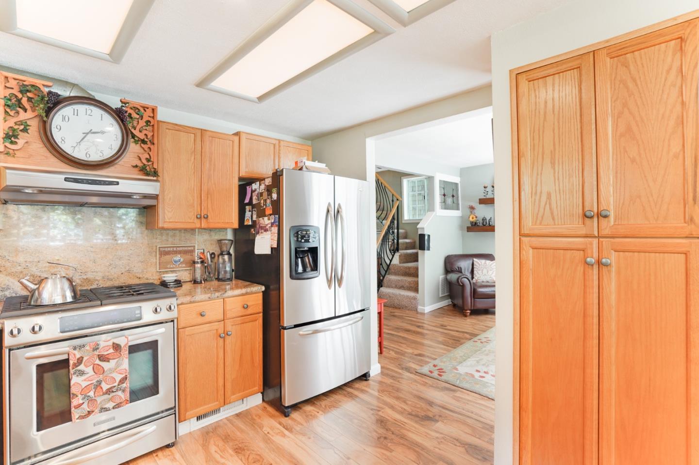 64 Pope Road La Honda, CA 94020 - Photo 12 of 32 a kitchen with a refrigerator a stove a washer and dryer
