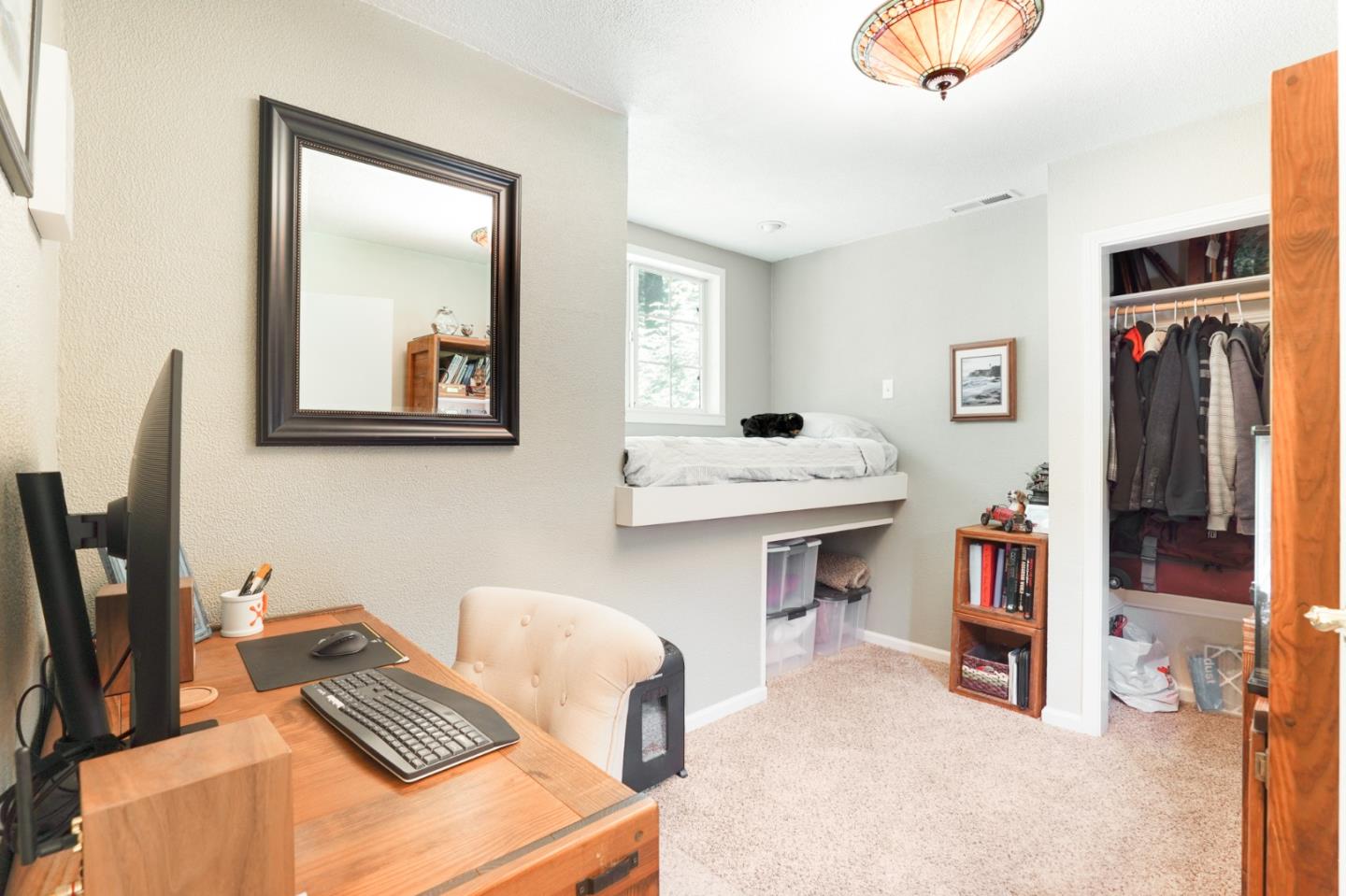 64 Pope Road La Honda, CA 94020 - Photo 19 of 32 a bedroom with furniture and a wooden floor