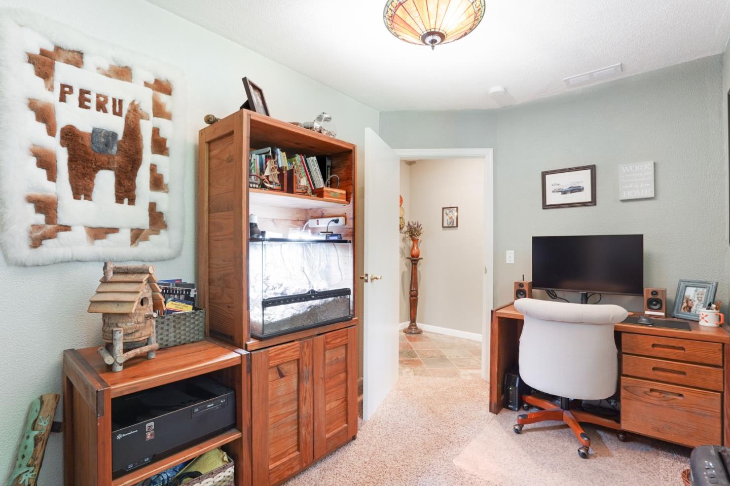 64 Pope Road La Honda, CA 94020 - Photo 20 of 32 a view of a workspace with furniture and a window