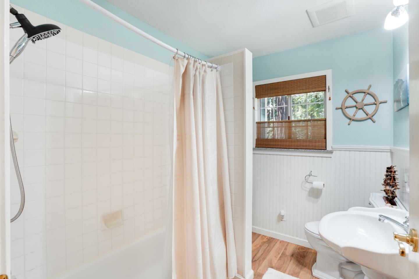 64 Pope Road La Honda, CA 94020 - Photo 23 of 32 a bathroom with a sink toilet and shower