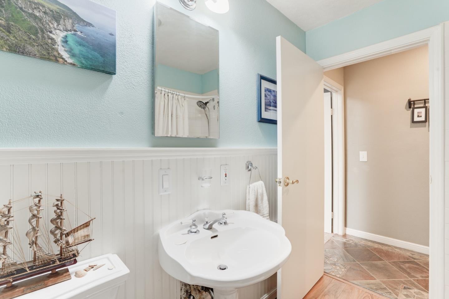 64 Pope Road La Honda, CA 94020 - Photo 24 of 32 a bathroom with a sink and a mirror