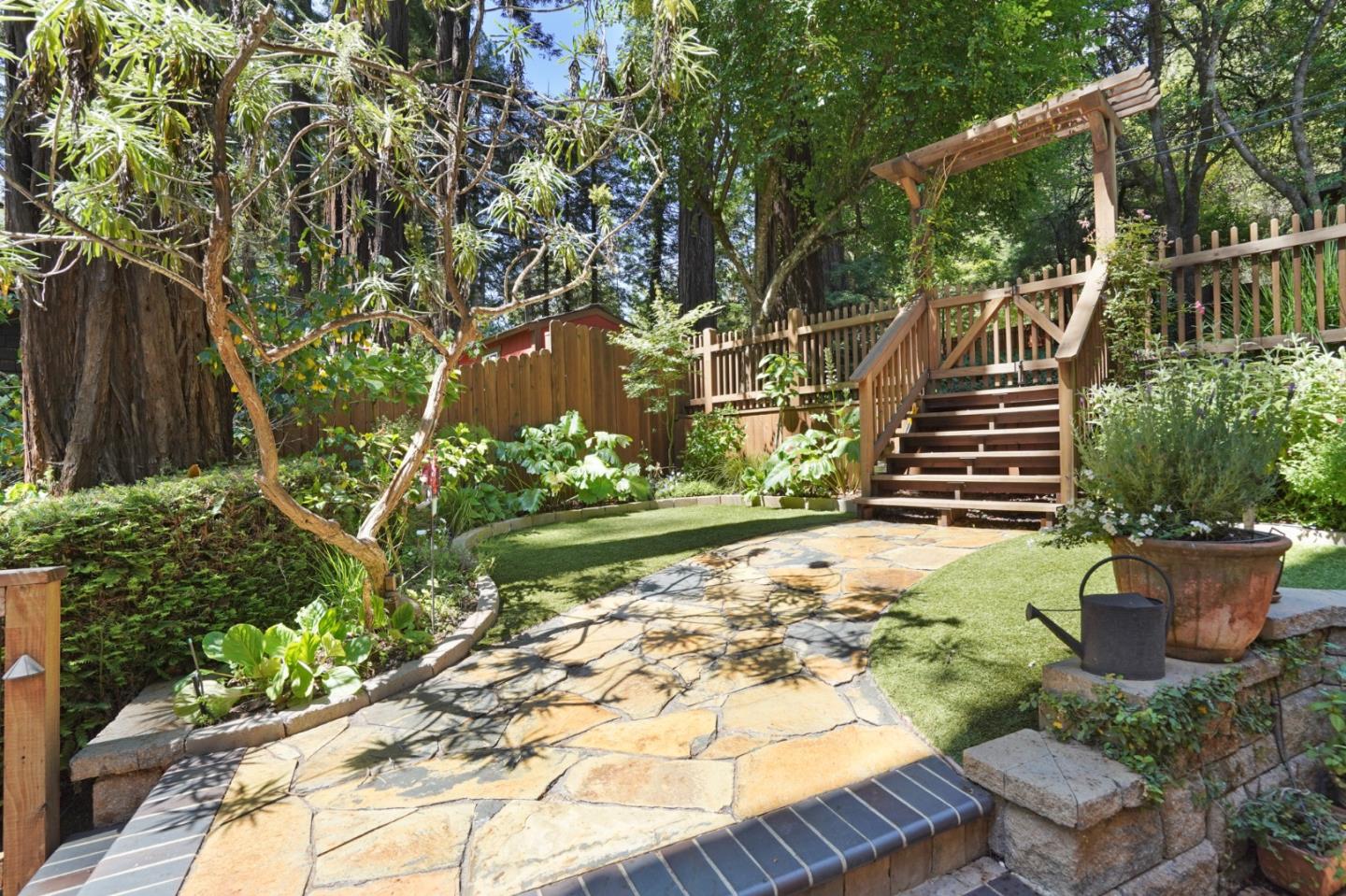 64 Pope Road La Honda, CA 94020 - Photo 25 of 32 a view of a backyard with sitting area