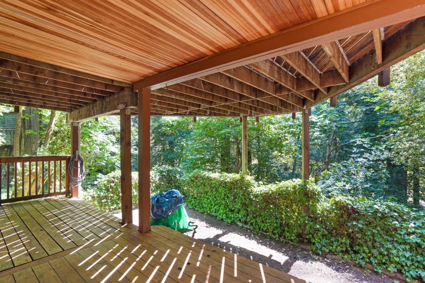 64 Pope Road La Honda, CA 94020 - Photo 28 of 32 a view of a patio with wooden floor