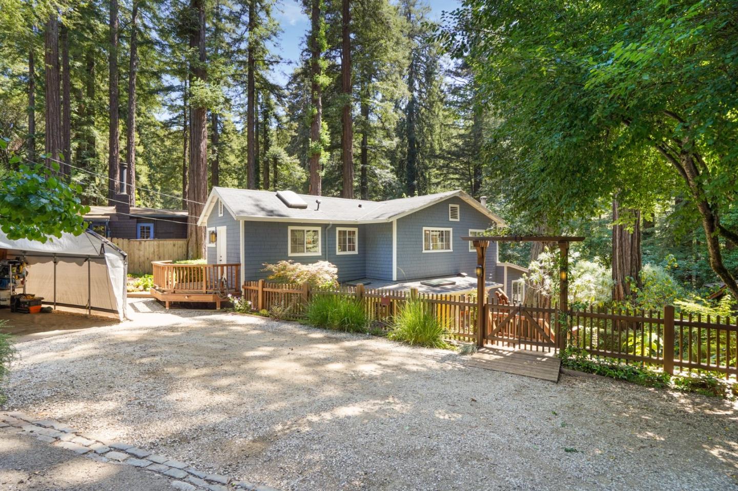 64 Pope Road La Honda, CA 94020 - Photo 3 of 32 a view of a house with a patio