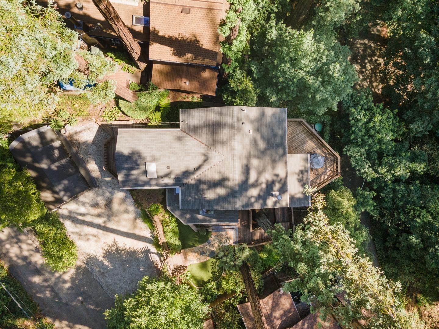 64 Pope Road La Honda, CA 94020 - Photo 31 of 32 an aerial view of a house with a yard and large trees
