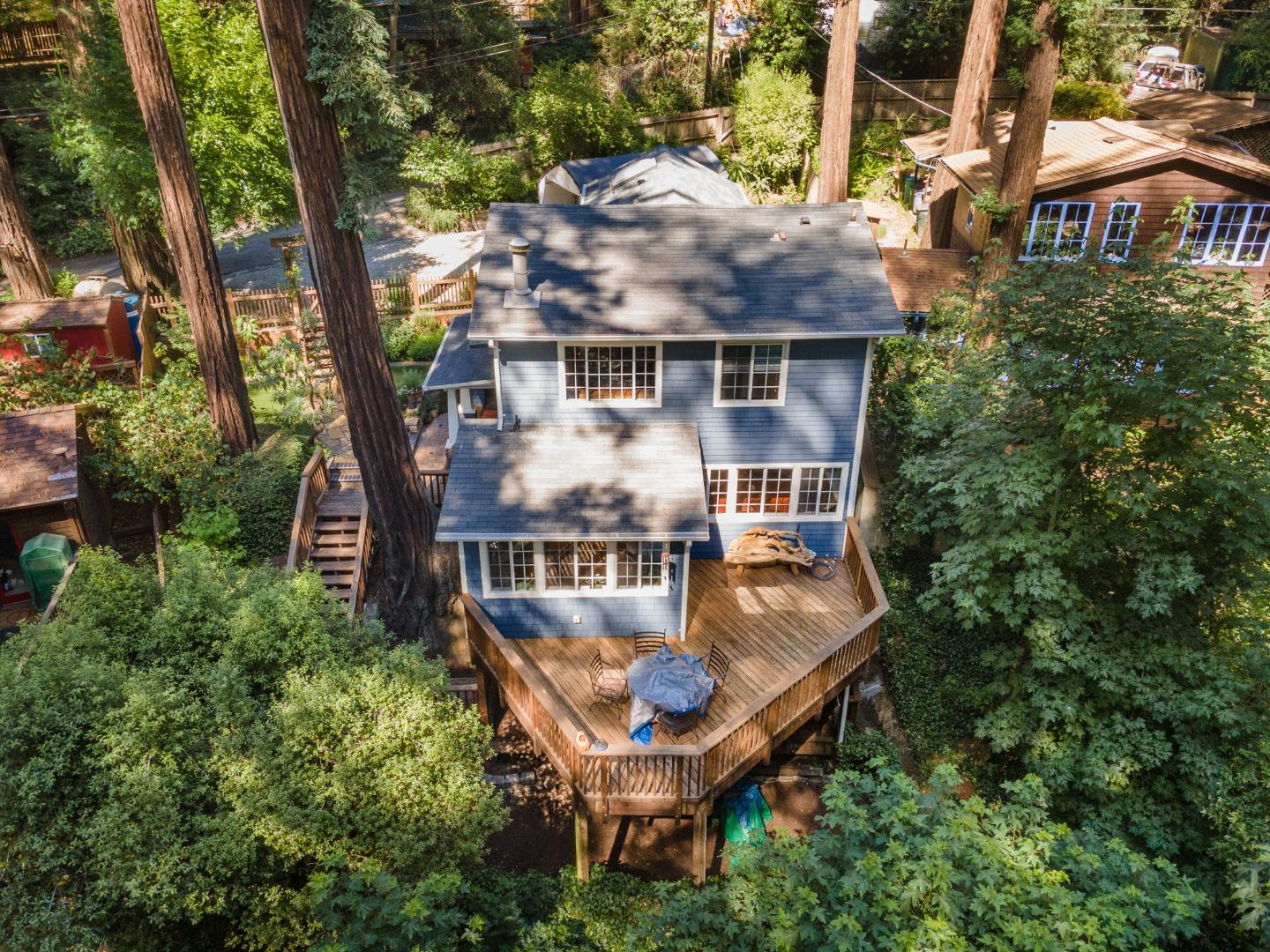 64 Pope Road La Honda, CA 94020 - Photo 32 of 32 an aerial view of a house with swimming pool and garden view