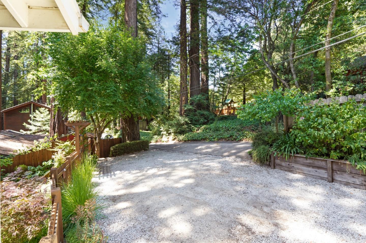 64 Pope Road La Honda, CA 94020 - Photo 5 of 32 a view of a yard with plants and trees