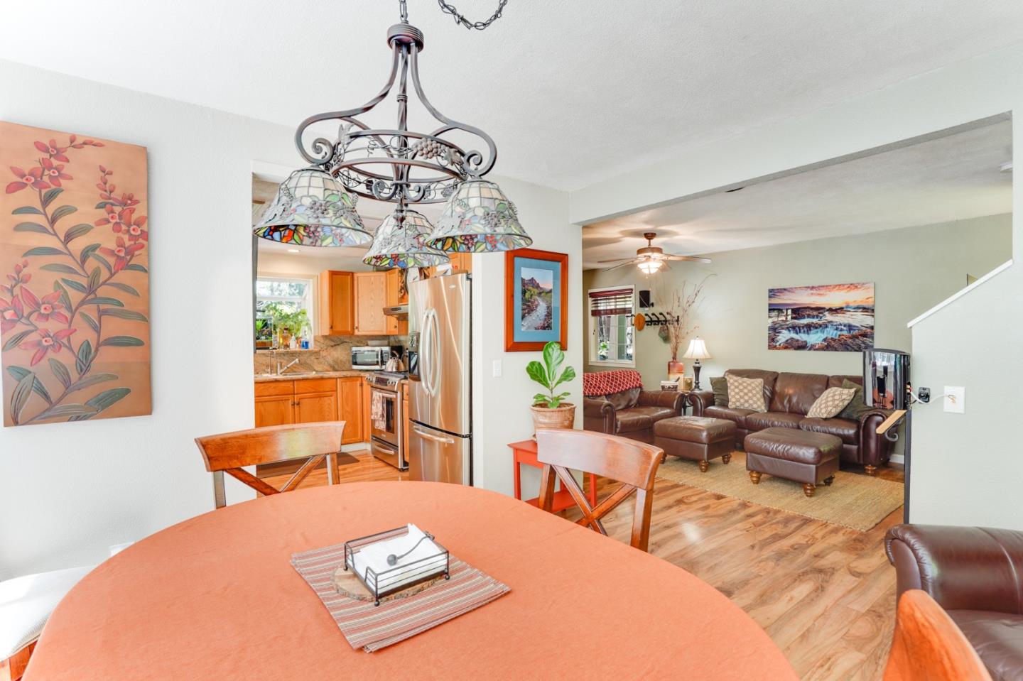 64 Pope Road La Honda, CA 94020 - Photo 10 of 32 a living room with furniture and a chandelier