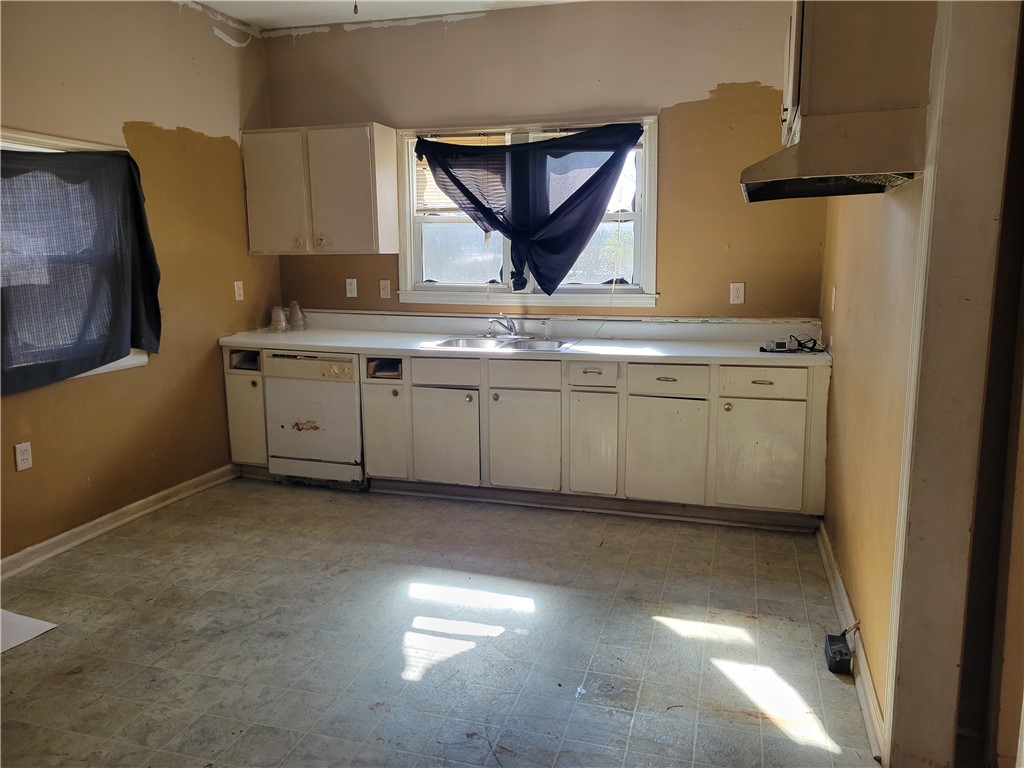1208 East Main Street Seneca, SC 29678 - Photo 17 of 19 This functional kitchen provides a practical layout ready for your personal touch.
