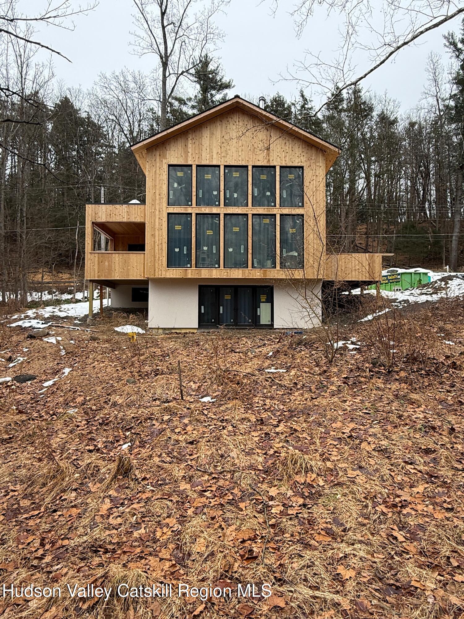332 Mohonk Road High Falls, NY 12440 - Photo 2 of 24 a front view of a house with a yard