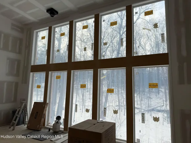 a kitchen with a sink a counter top space and appliances