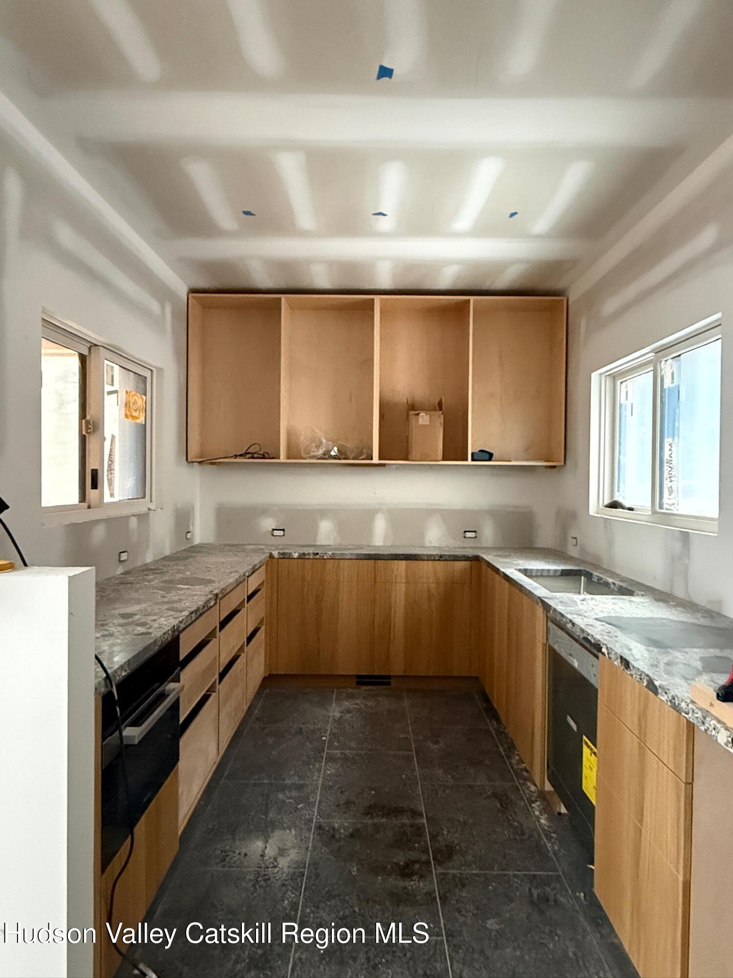332 Mohonk Road High Falls, NY 12440 - Photo 8 of 24 a kitchen with a sink a counter top space and appliances