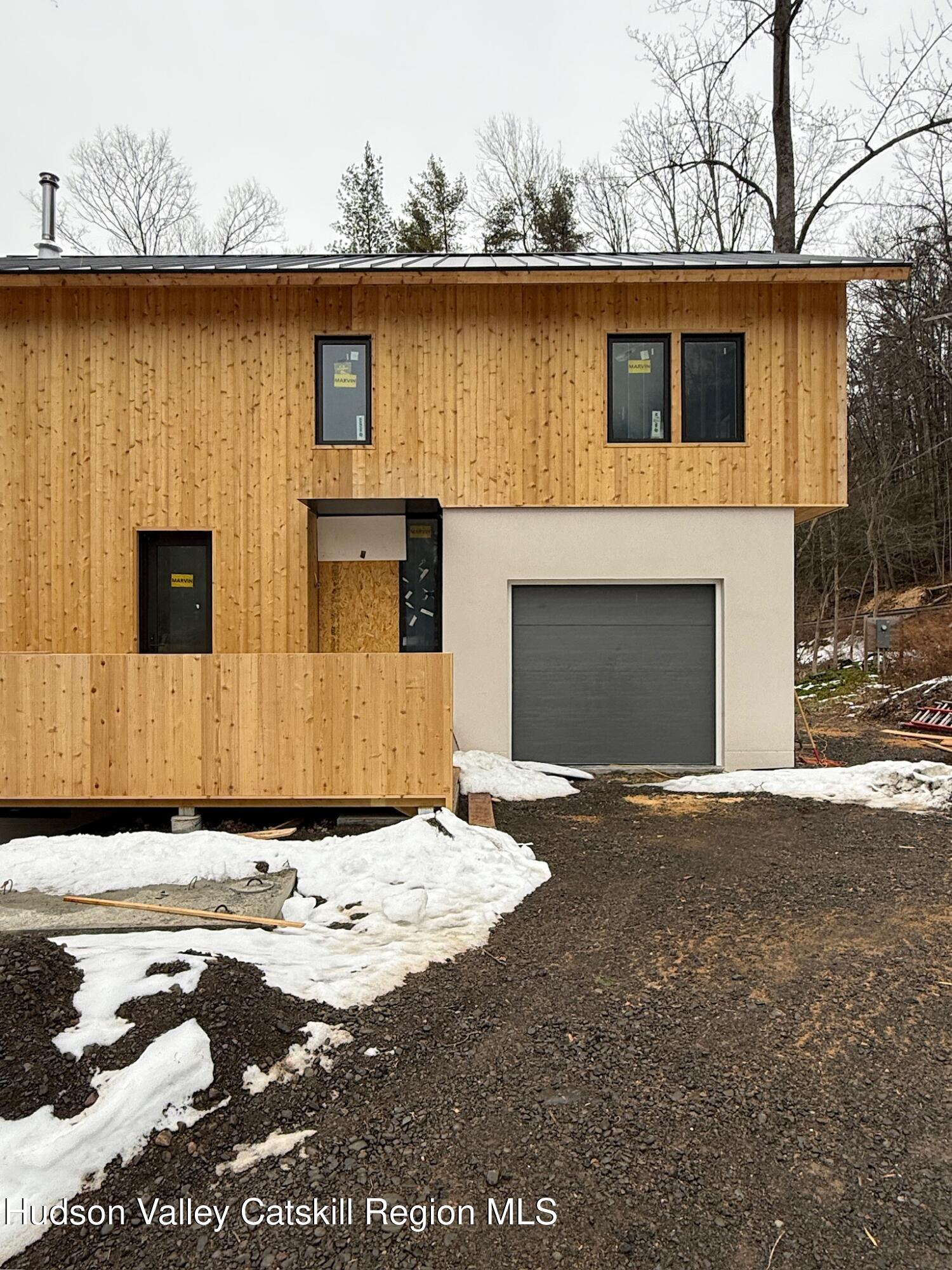 332 Mohonk Road High Falls, NY 12440 - Photo 9 of 24 a front view of a house with a yard