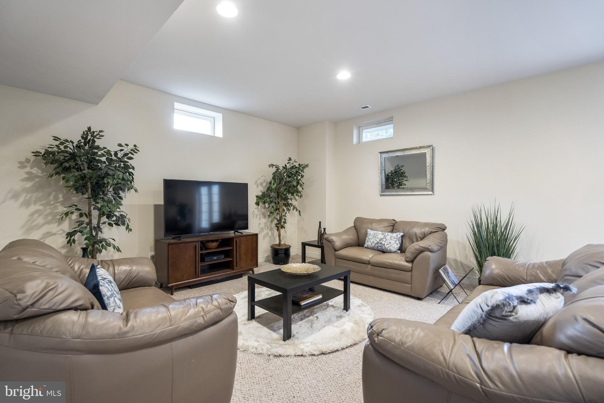 6017 Riggs Road Laytonsville, MD 20882 - Photo 48 of 64 Sunfilled lower level rec room