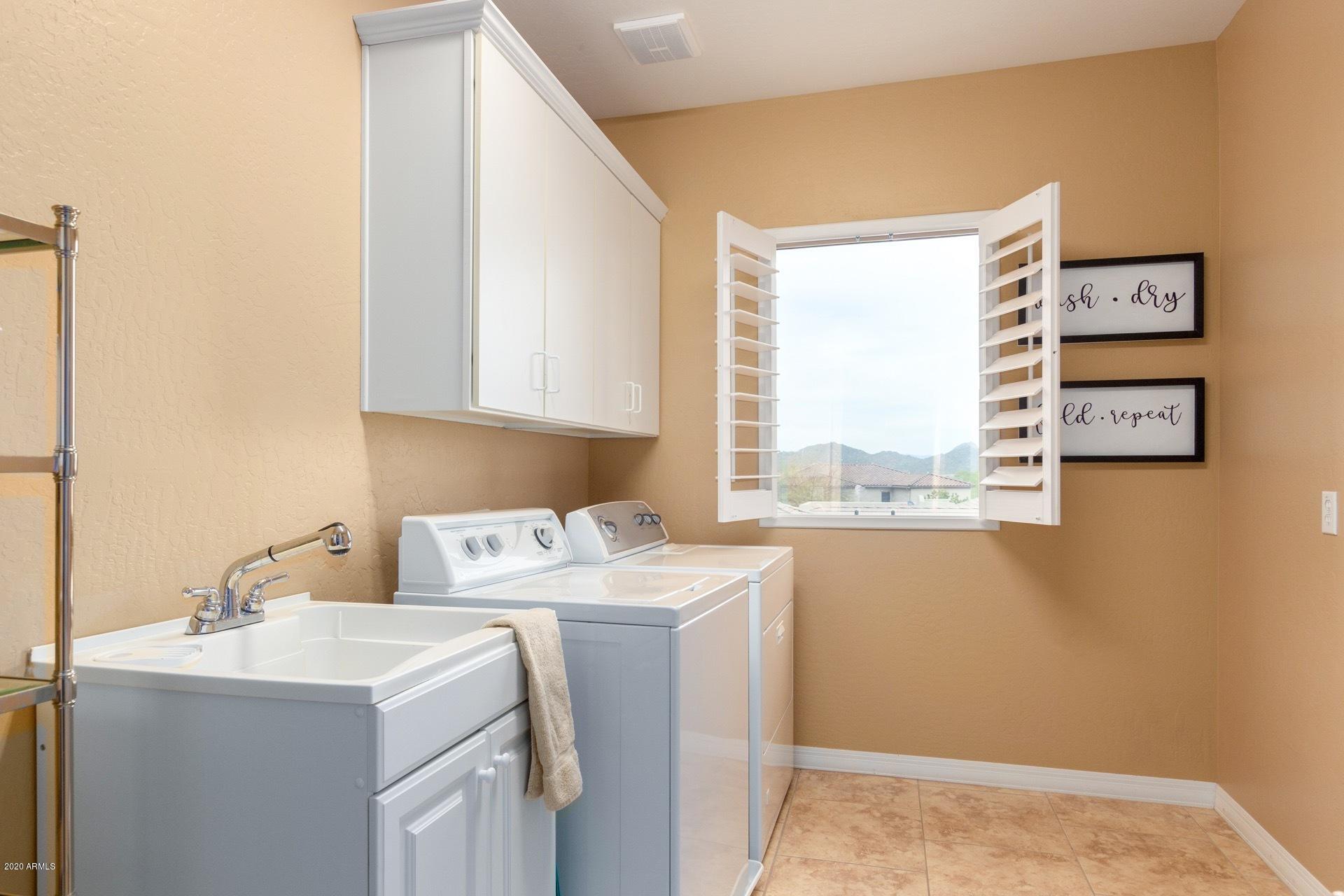 8653 West Rowel Road Peoria, AZ 85383 - Photo 50 of 66 Upstairs laundry room