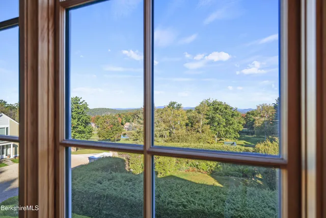 a aerial view of a house with a garden and plants