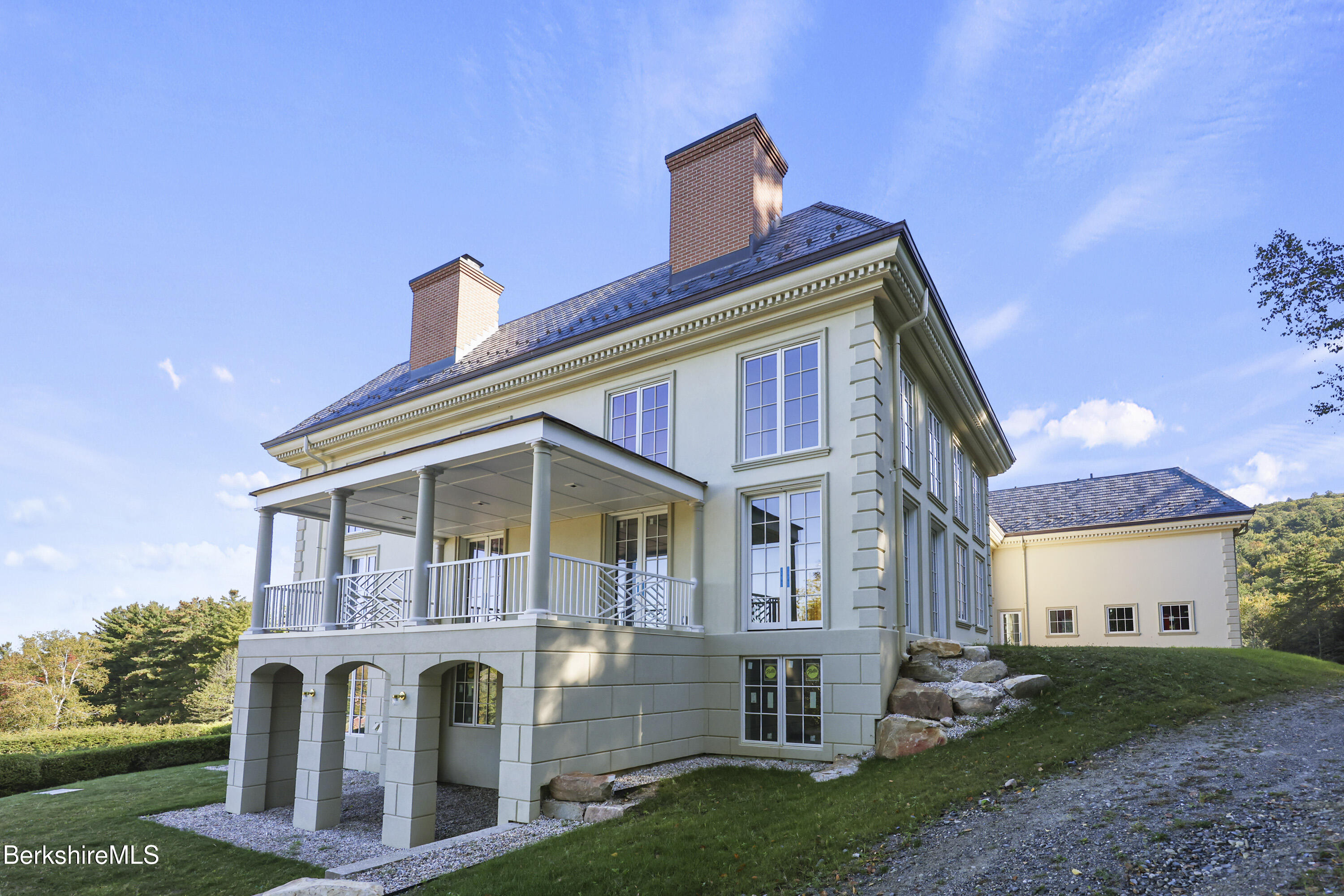 209 Blue Hill Road Great Barrington, MA 01230 - Photo 30 of 46 a front view of a house with garden