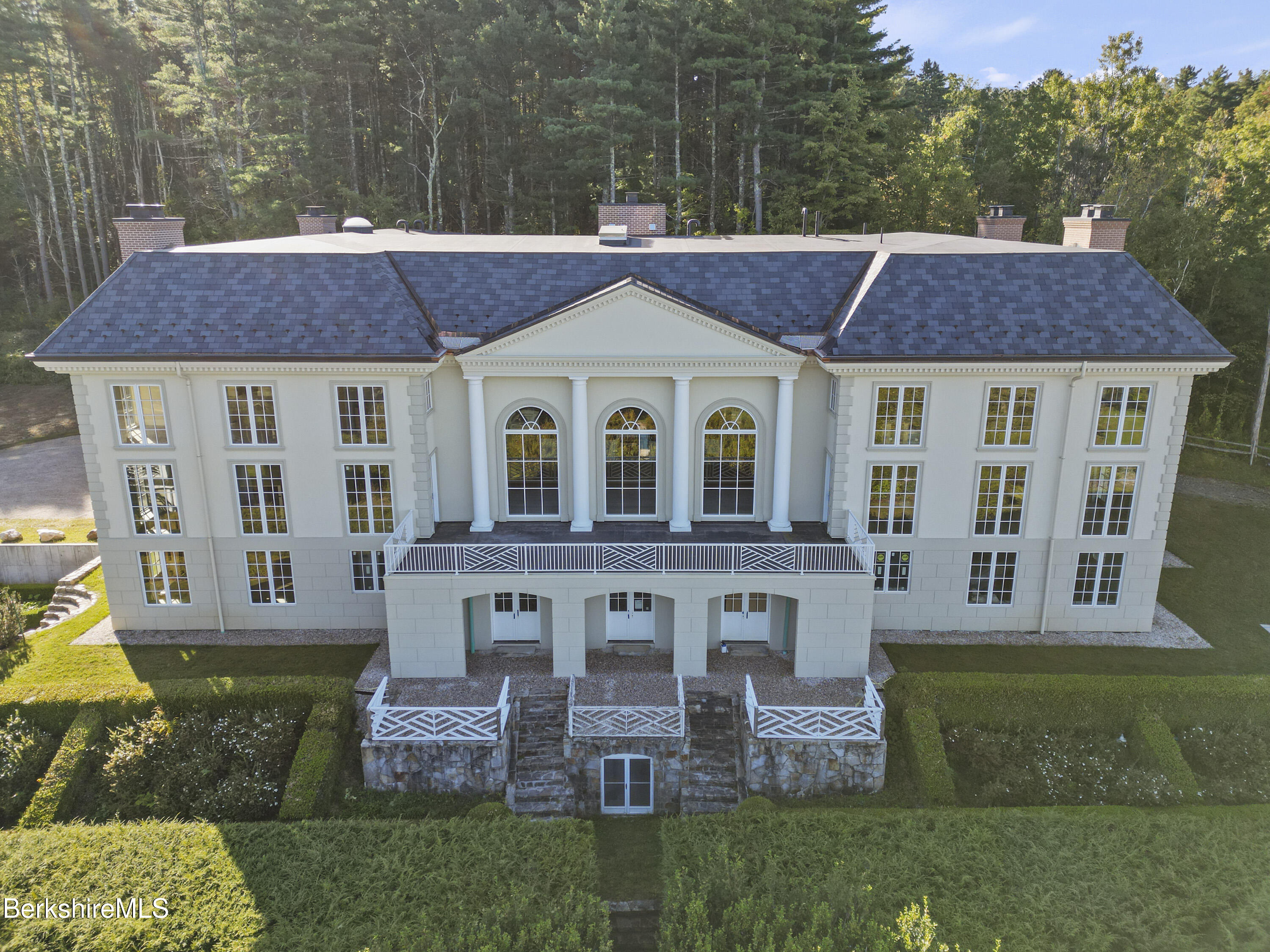209 Blue Hill Road Great Barrington, MA 01230 - Photo 46 of 46 a aerial view of a house with a garden and plants