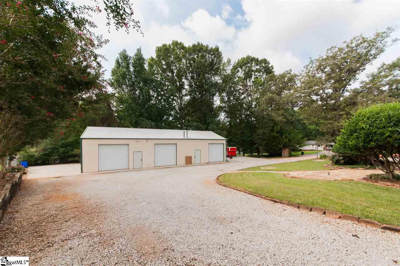 600 Tigerville Road Travelers Rest, SC 29690 - Photo 2 of 35 circular driveway from Tigerville Rd to Dell Circle allows for any access needed to this fabulous building