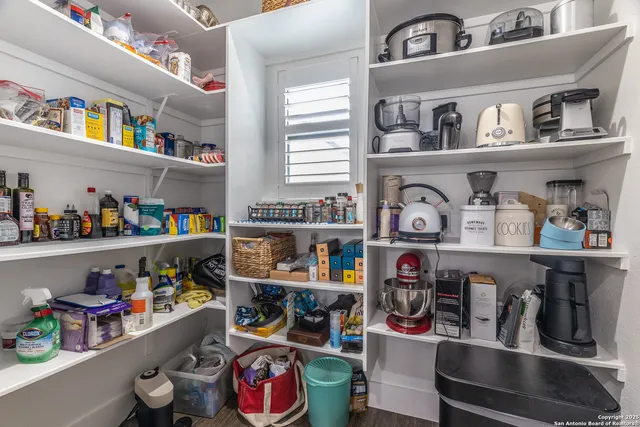 a room with storage and utility