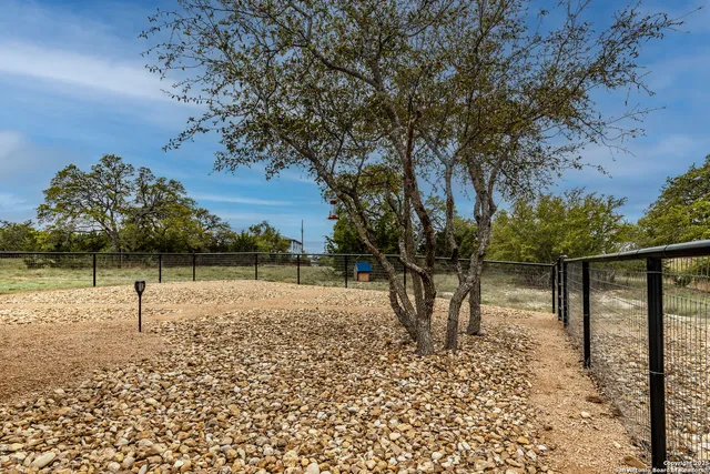 a view of a lake with a yard