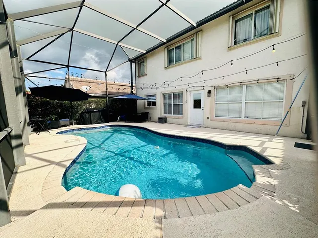 a view of yard with a patio