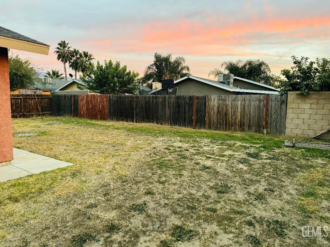 Undisclosed Address Arvin, CA 93203 - Photo 12 of 29 a swimming pool with wooden fence