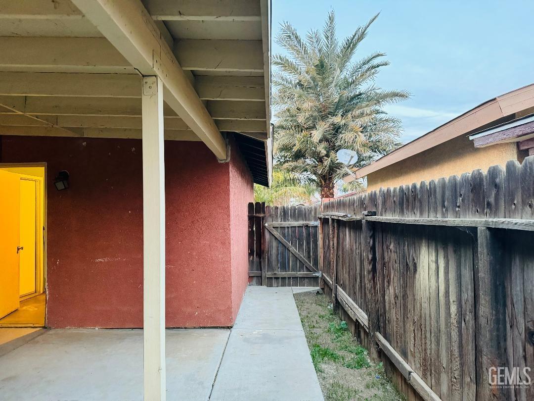 Undisclosed Address Arvin, CA 93203 - Photo 16 of 29 a path view of balcony with wooden floor