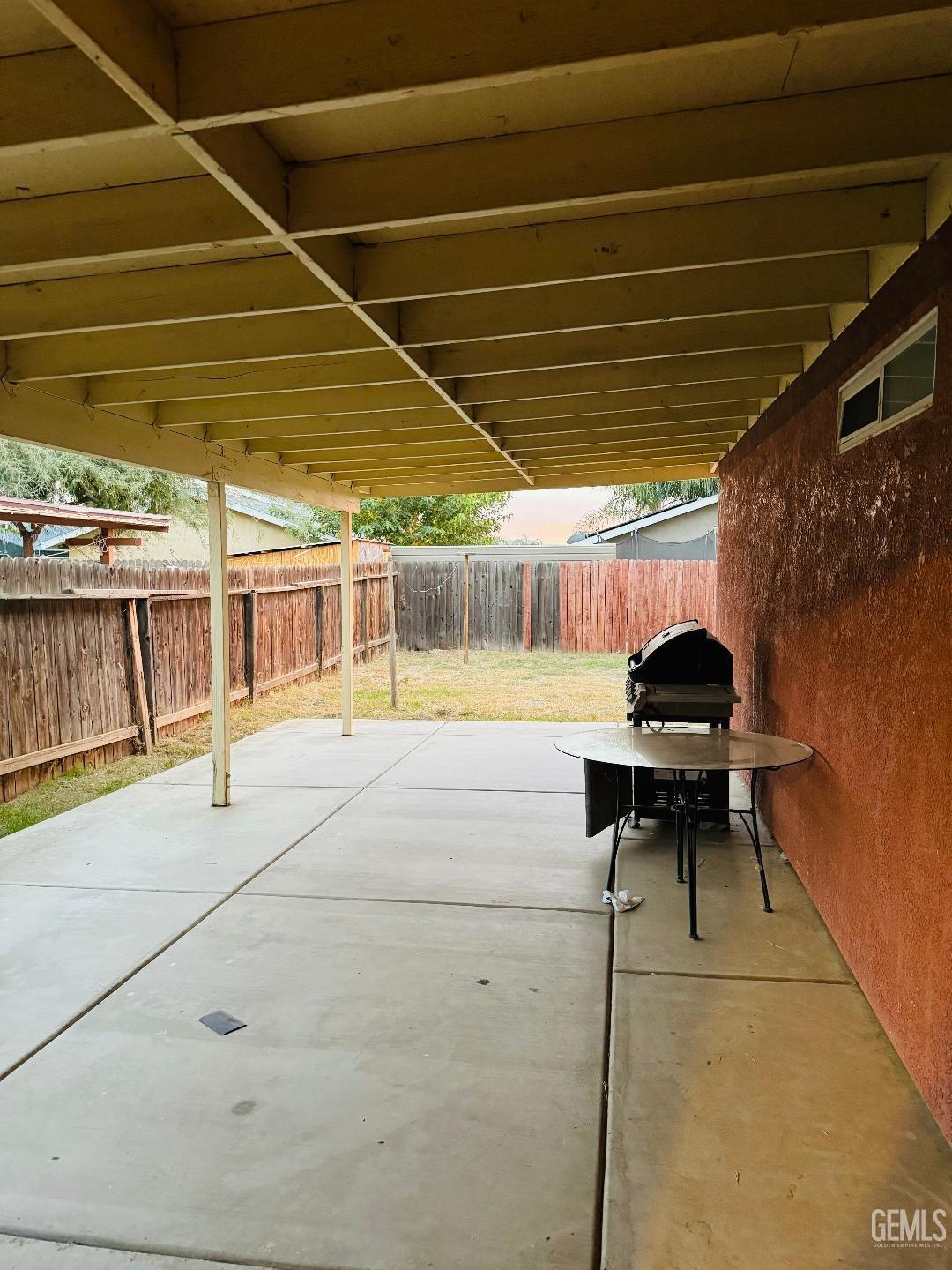 Undisclosed Address Arvin, CA 93203 - Photo 17 of 29 a view of a tennis room with a table and chairs