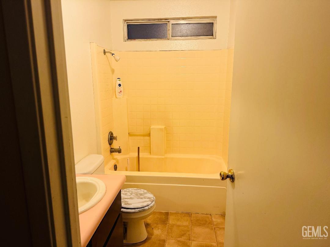 Undisclosed Address Arvin, CA 93203 - Photo 29 of 29 a bathroom with a granite countertop toilet and a sink