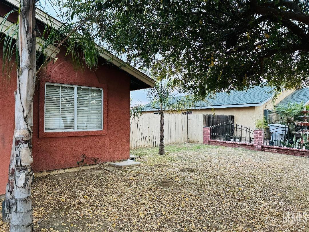 Undisclosed Address Arvin, CA 93203 - Photo 6 of 29 a house with trees in the background