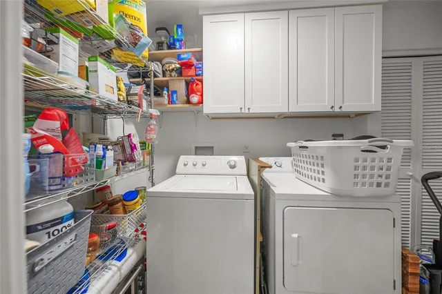 an aerial view of a house with a lake view