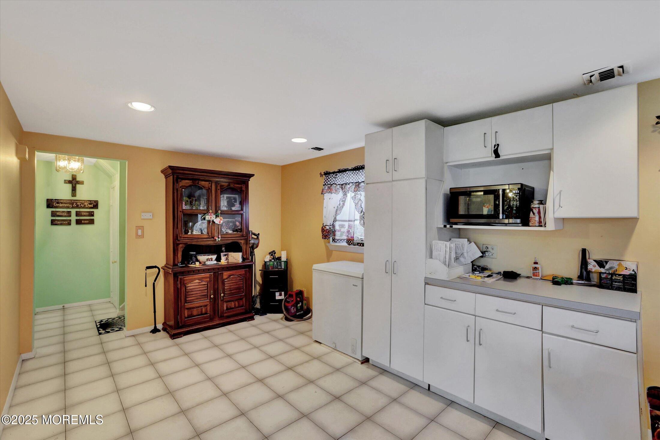 12 Steven Place Jackson, NJ 08527 - Photo 12 of 31 a kitchen with stainless steel appliances a refrigerator sink and microwave