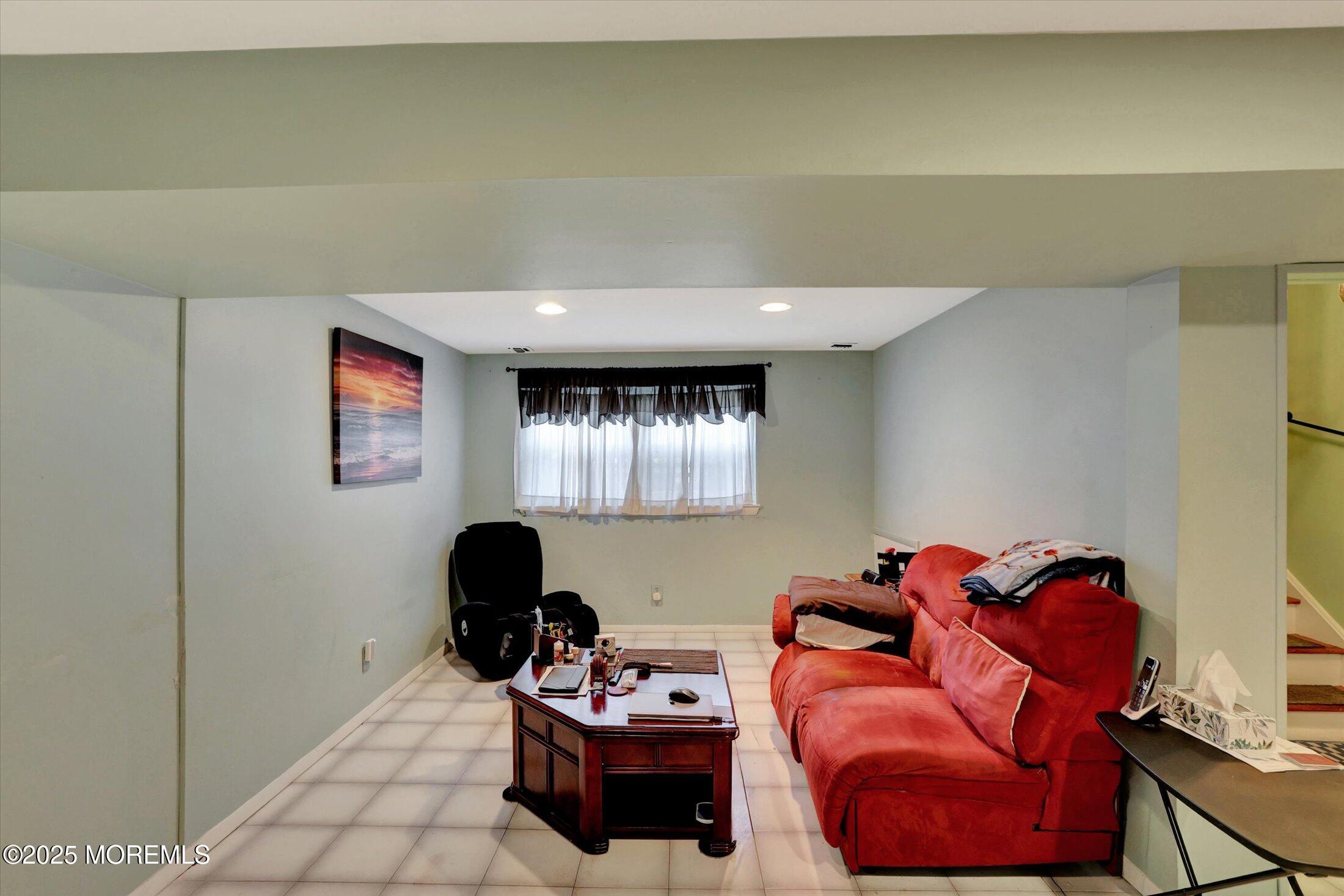12 Steven Place Jackson, NJ 08527 - Photo 17 of 31 a living room with furniture and a window