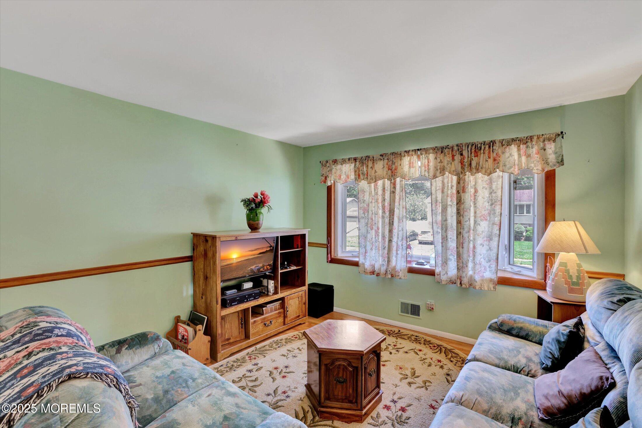 12 Steven Place Jackson, NJ 08527 - Photo 2 of 31 a living room with furniture and a window