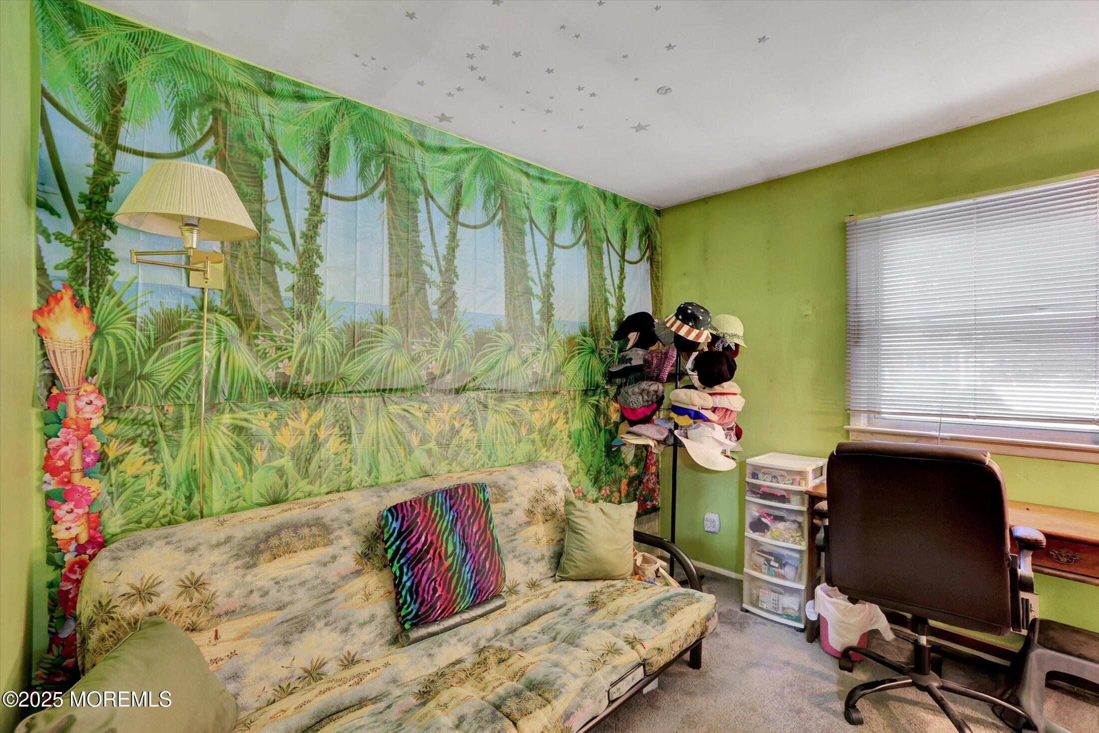 12 Steven Place Jackson, NJ 08527 - Photo 21 of 31 a living room with a couch and a potted plant