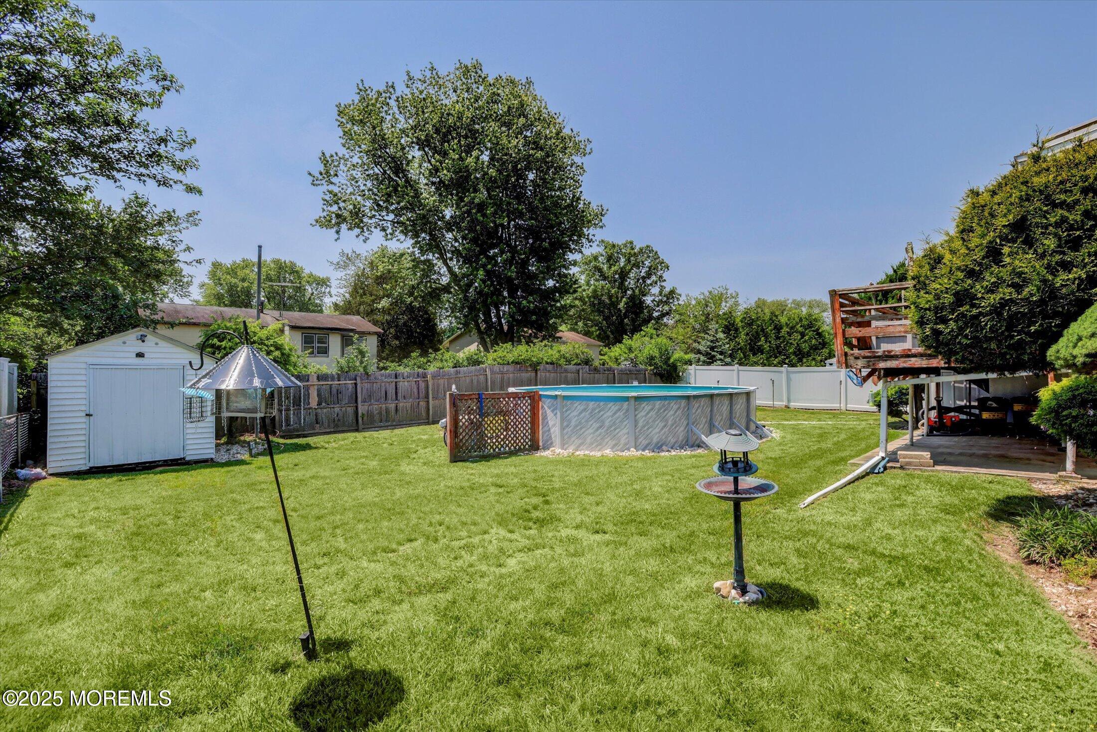 12 Steven Place Jackson, NJ 08527 - Photo 29 of 31 a house view with a play ground in front of it