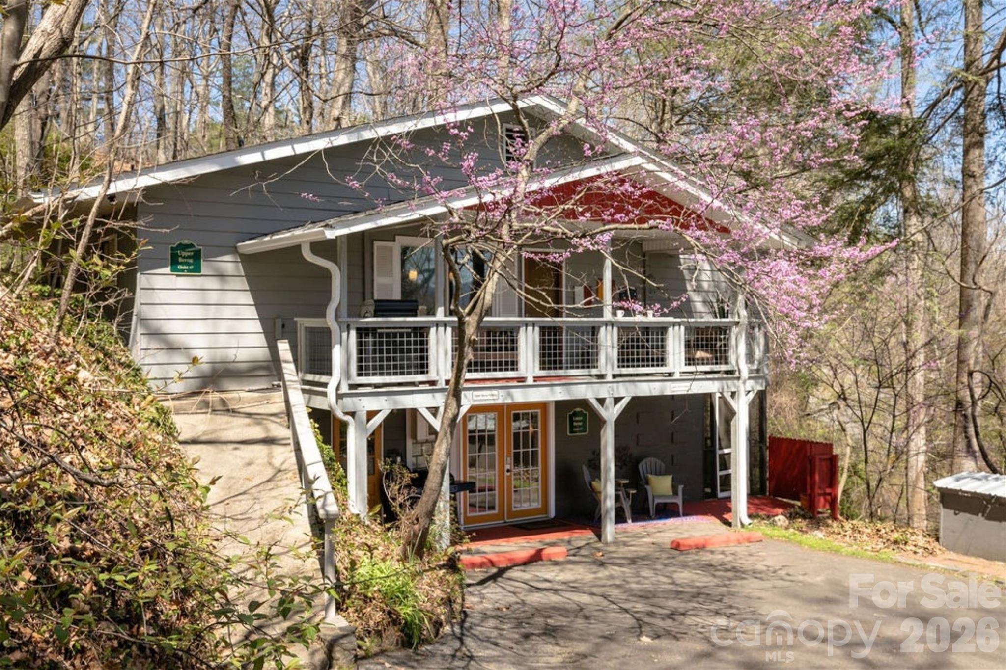 7 North Delano Road Asheville, NC 28805 - Photo 32 of 32 a view of a house with large trees
