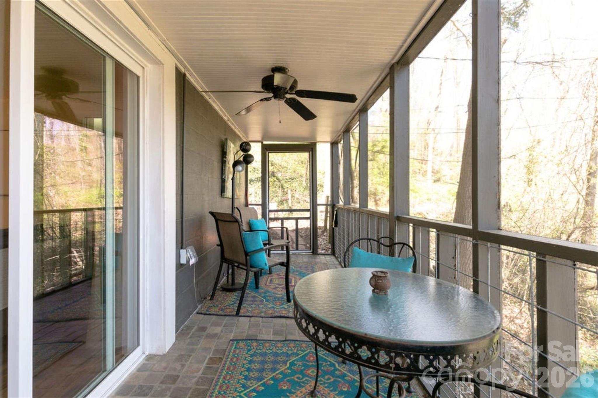 7 North Delano Road Asheville, NC 28805 - Photo 4 of 32 a view of a dining room with furniture window and outside view