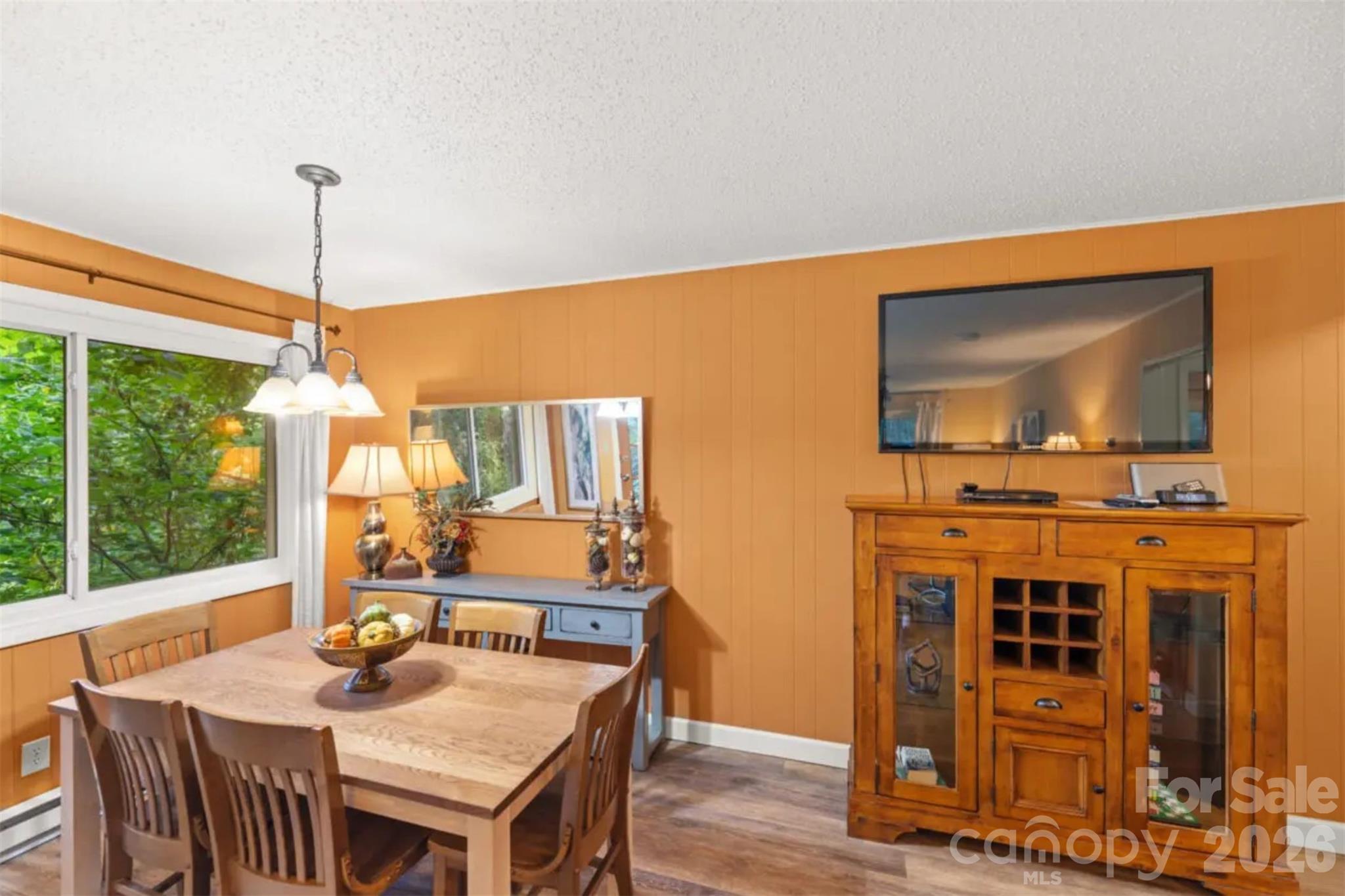7 North Delano Road Asheville, NC 28805 - Photo 10 of 32 a dining room with furniture window and outside view