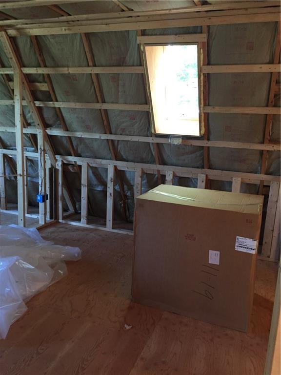 1063 Meadow Pond Road Islesboro, ME 04848 - Photo 11 of 20 master bedroom area with sky light