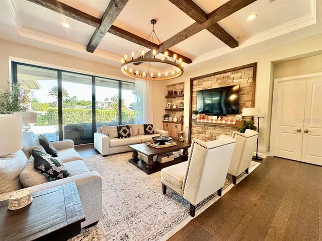 a kitchen with stainless steel appliances granite countertop a sink and cabinets
