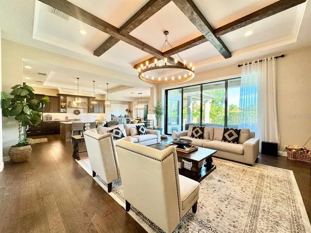 a kitchen with stainless steel appliances granite countertop a stove and a sink