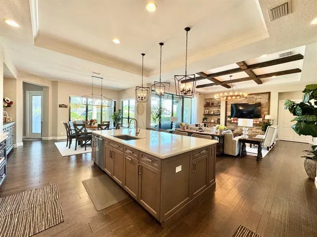 a en suite bathroom with a double vanity sink and a mirror