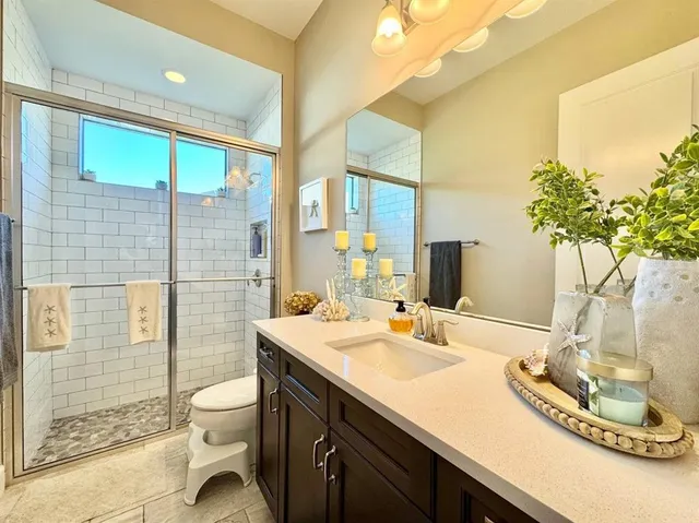 a outdoor dining space with furniture and a potted plant