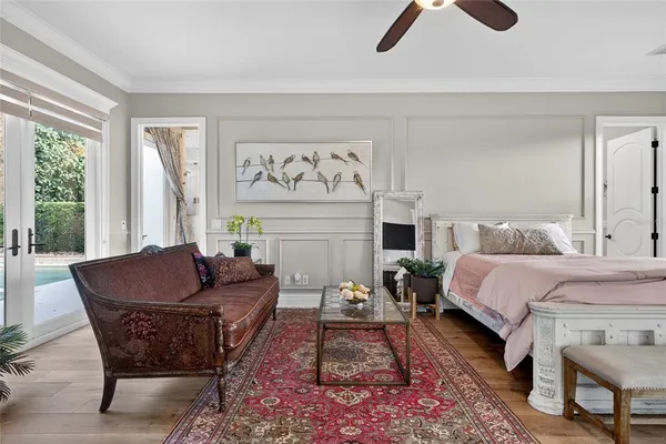 a room with furniture and a potted plant