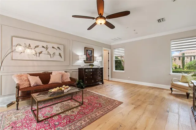 a living room with furniture and a rug