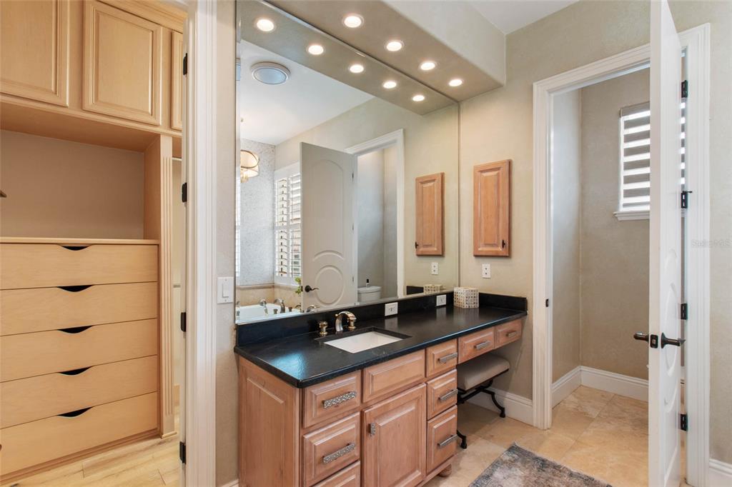 248 Maison Court Altamonte Springs, FL 32714 - Photo 20 of 47 a bathroom with a double vanity sink and a mirror